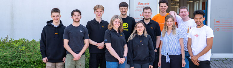 Group of trainees smiling into the camera