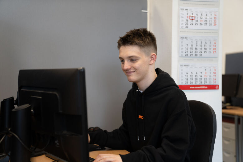 Young man working on the pc