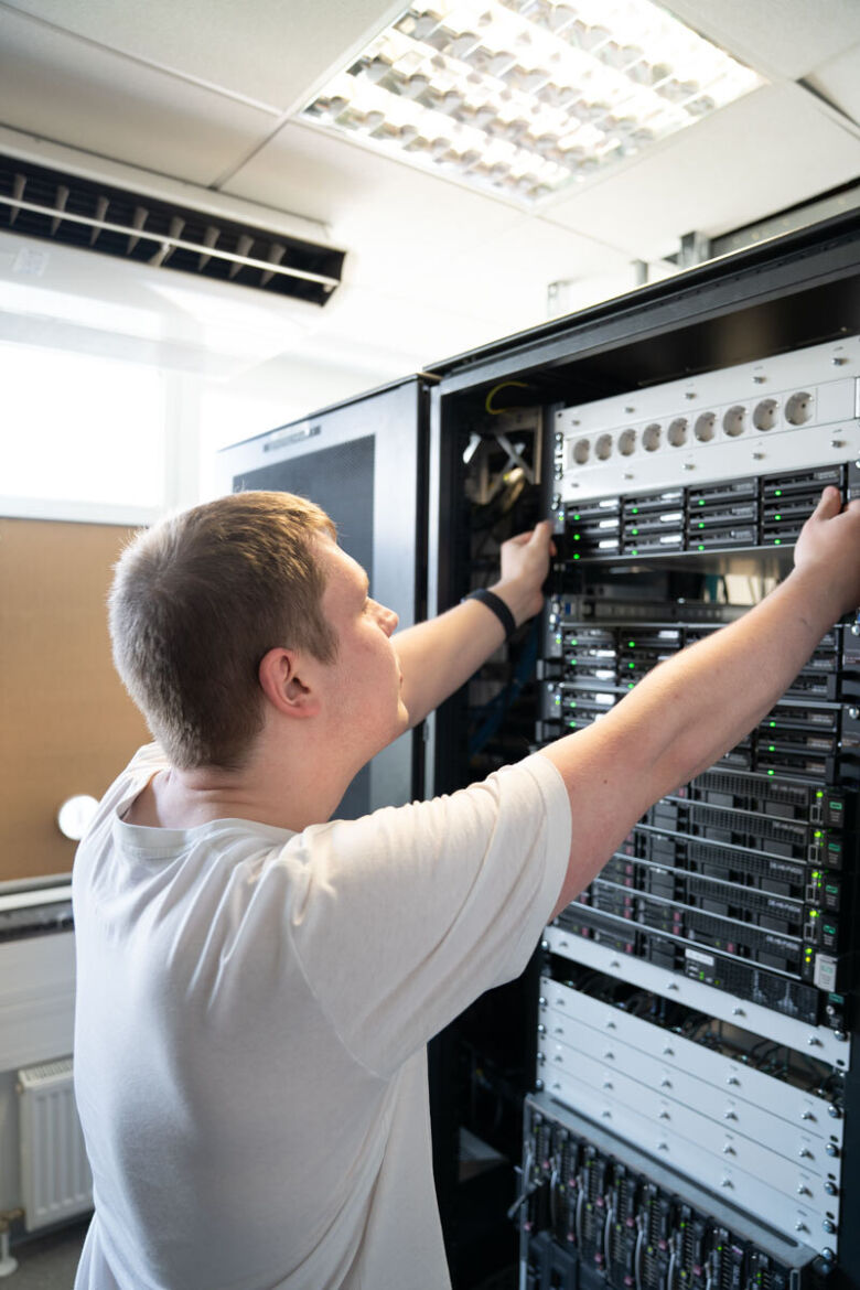 Man working with IT Equipment